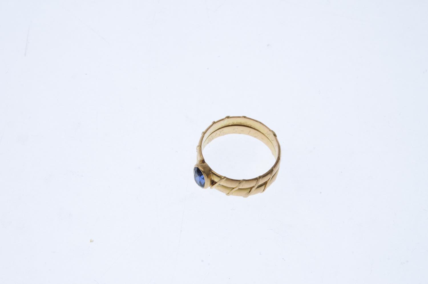 A sapphire single-stone ring. The oval-shape sapphire collet, atop the double band, with diagonal - Image 3 of 3