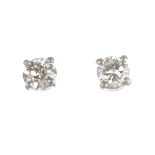 A pair of platinum brilliant-cut diamond stud earrings. Estimated total diamond weight 0.50ct, H-I