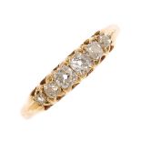 A late Victorian 18ct gold diamond six-stone ring. The graduated old-cut diamond line, with