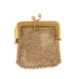An early 20th century gold mesh coin purse. Of square outline, the mesh purse with plain frame
