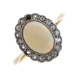 An opal and cubic zirconia cluster ring. The oval opal cabochon, with single-cut cubic zirconia