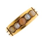 A mid 20th century 18ct gold coral and split pearl ring. The alternating circular coral cabochon and