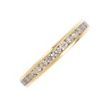 An 18ct gold diamond half eternity ring. The brilliant-cut diamond line, inset to the band. Total