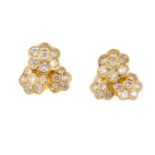 CLOGAU - a pair of diamond cluster earrings. Each designed as a brilliant-cut diamond floral cluster