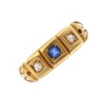 A late 19th century 18ct gold paste and diamond three-stone ring. The circular-shape blue paste,