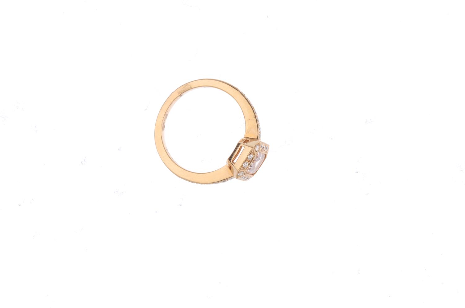 An 18ct gold morganite and diamond cluster ring. The rectangular-shape morganite, with brilliant-cut - Image 2 of 3