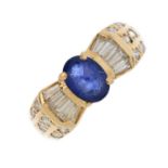 A 14ct gold sapphire and diamond dress ring. The oval-shape sapphire, with vari-cut diamond