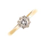 A mid 20th century 18ct gold diamond single-stone ring. The brilliant-cut diamond, with tapered