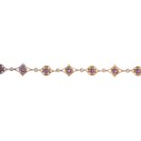 An amethyst bracelet. Designed as a series of circular-shape amethysts, each within an alternating