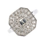 A platinum diamond cluster ring. The cushion-shape diamond, within a brilliant-cut diamond double