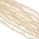 A freshwater cultured pearl multi-strand necklace. Comprising five strands of baroque freshwater