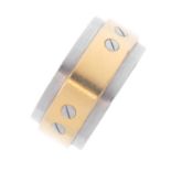 CARTIER - a gentleman's steel and gold 'Love' ring. The steel band, with raised central panel and