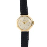 ZENITH - a lady's 1950's 9ct gold manual-wind wristwatch. The hexagonal-shape cream coloured dial,