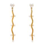 A pair of seed pearl earrings. Each designed as an undulating line with seed pearl highlights,