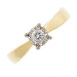 An 18ct gold diamond single-stone ring. The brilliant-cut diamond, with illusion-setting and tapered