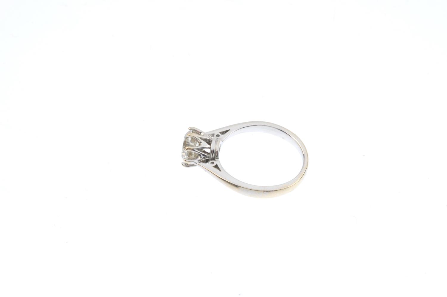 An 18ct gold diamond single-stone ring. The brilliant-cut diamond, with tapered shoulders. Estimated - Image 2 of 3