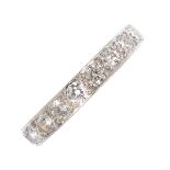 An 18ct gold diamond half eternity ring. Designed as a brilliant-cut diamond line. Total diamond