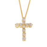 A diamond cross pendant. The brilliant-cut diamond cross pendant, with fancy-link chain. Estimated