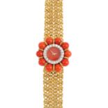 KUTCHINSKY, for LE COULTRE - a 1960s 18ct gold coral and diamond wrist watch. The circular coral