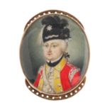 A late Georgian portrait miniature clasp. Of oval outline, painted to depict a British Redcoat