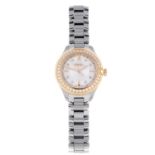 EBEL - a lady's Onde bracelet watch. Stainless steel case with yellow metal factory diamond set