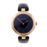 GUCCI - a lady's Diamantissima wrist watch. Gold plated case. Reference 141.4, serial 15483561.