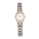 EBEL - a lady's Classic Sport bracelet watch. Stainless steel case with yellow metal factory diamond