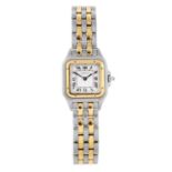 CARTIER - a Panthere bracelet watch. Stainless steel case with yellow metal bezel. Reference 1120,
