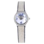 CORUM - a lady's Bubble wrist watch. Stainless steel case with factory diamond set bezel.