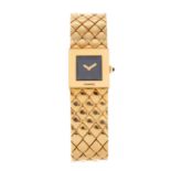 CHANEL - a lady's Matelasse bracelet watch. 18ct yellow gold case. Numbered V.N.91214. Unsigned