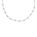 An 18ct gold sapphire and diamond necklace. Designed as a series of brilliant-cut diamond bar links,