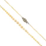 A natural pearl single-strand and diamond necklace. Comprising a single-strand of 137 pearls,