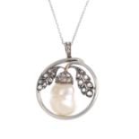 A cultured pearl and diamond pendant. The baroque cultured pearl acorn, with rose-cut diamond cap