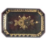 A late 19th century tortoiseshell pique brooch. Of rectangular outline with central inlaid floral