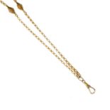 A late Victorian 15ct gold chain. Of banded texture, the belcher-link chain with three bi-conical