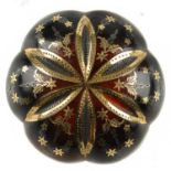 A late 19th century pique tortoiseshell brooch. In the shape of a scalloped flower, with inlaid