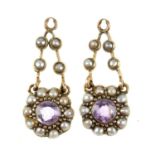 A pair of early 20th century gold amethyst and split pearl ear pendant panels. The circular