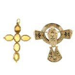 An early 20th century brooch and citrine pendant. The cross pendant set with six oval-shape