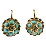 A pair of early 20th century 9ct gold turquoise earrings. Of domed circular shape, both set with six