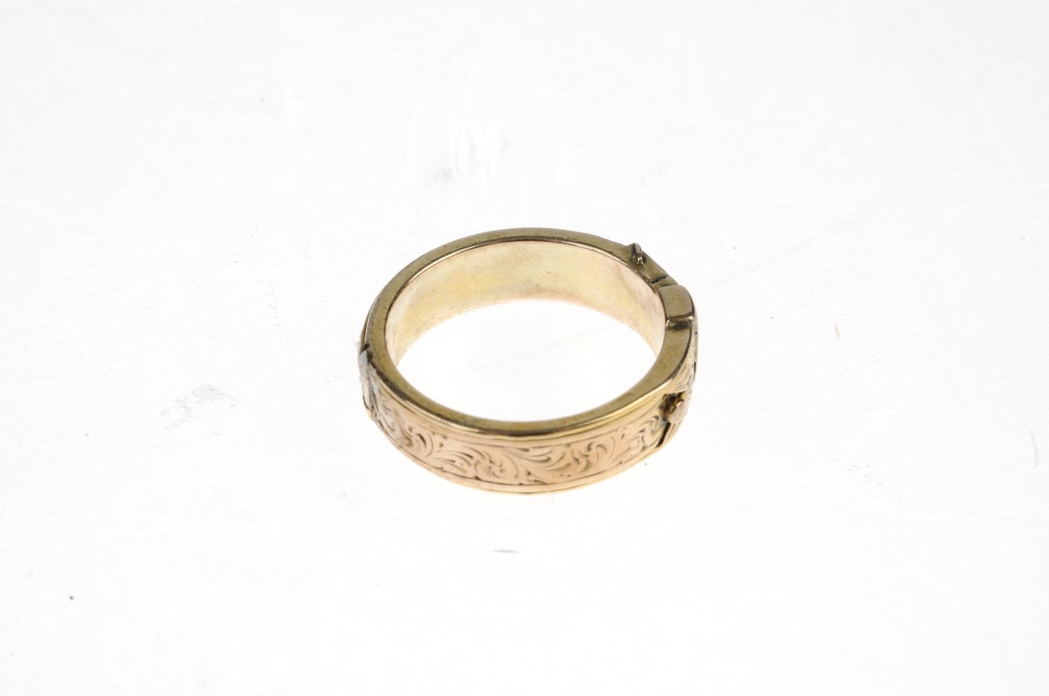 A late Victorian buckle ring. With foliate engraving to the full ring, hinged on two sides and - Image 3 of 5