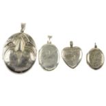 A selection of silver and white metal lockets. To include an oval shape locket with raised detail