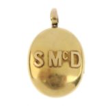 A late Victorian 18ct gold locket. Of oval outline, with raised initials S McD, to the tapered