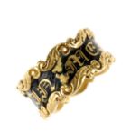 A George IV 18ct gold enamel memorial ring. Designed as a band with recessed black enamel reading '