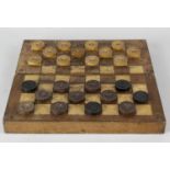 Two late 19th century games boxes. The first having a hinged chess board top enclosing gilt-