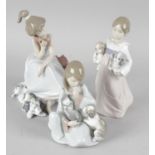 Five Lladro figurines. All featuring dogs or cats, comprising: Playful Kittens 5232, Chit Chat 5466,