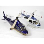 A large radio controlled scale model Bell Long Ranger model helicopter with fitted engine, fitted