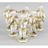 A set of six Sitzendorf porcelain Turkish band figures, each figure modelled standing playing a