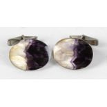 A pair of sterling silver-backed Blue John cufflinks. Each of oval form and Treak Cliff Blue vein,