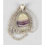 A Blue John and sterling silver pendant. Winnats One vein, the oval panel 0.7, (1.7cm) high, in