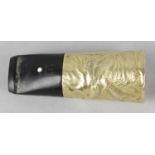 A good Dunhill 9ct gold cigar holder. The body with 'Samorodok' effect textured decoration,